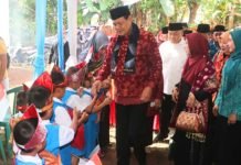 Bupati Muara Enim Hadiri Sedekah Desa dan Resmikan Jembatan Gantung di Desa Keban Agung
