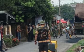 Melalui Gerakan Indonesia Asri, Koramil 402-10/Kayuagung Tanamkan Kepedulian Lingkungan