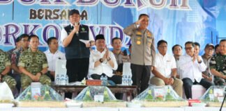Polda Sumsel Kawal Aksi Damai Ratusan Buruh dan Gelar Potong Tumpeng Bersama