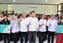 Perluas Perlindungan Sosial, Pemkab Lampung Selatan Roadshow Penyerahan Kartu BPJS Ketenagakerjaan di Katibung