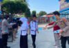 Cegah Dampak Kabut Asap Karhutla, Polres OKI Bagikan Masker ke Pelajar SMPN 6 Kayuagung