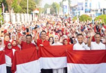 Bupati OKI Bagikan 3.000 Bendera Merah Putih, Ajak Masyarakat Semarakkan HUT ke-81 RI