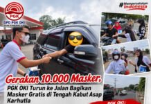 Gerakan 10.000 Masker, PGK OKI Bagikan Masker Gratis di Tengah Kabut Asap Karhutla