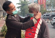 Polda Sumsel Bagikan 2.000 Masker untuk Lindungi Kesehatan Warga Palembang